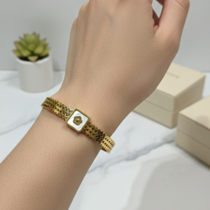 Golden Floral Adjustable Bracelet with Emerald Stones