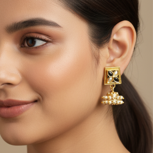 Small square gold stud top with four petal-like white stones, and a hanging dome cluster of small white pearls